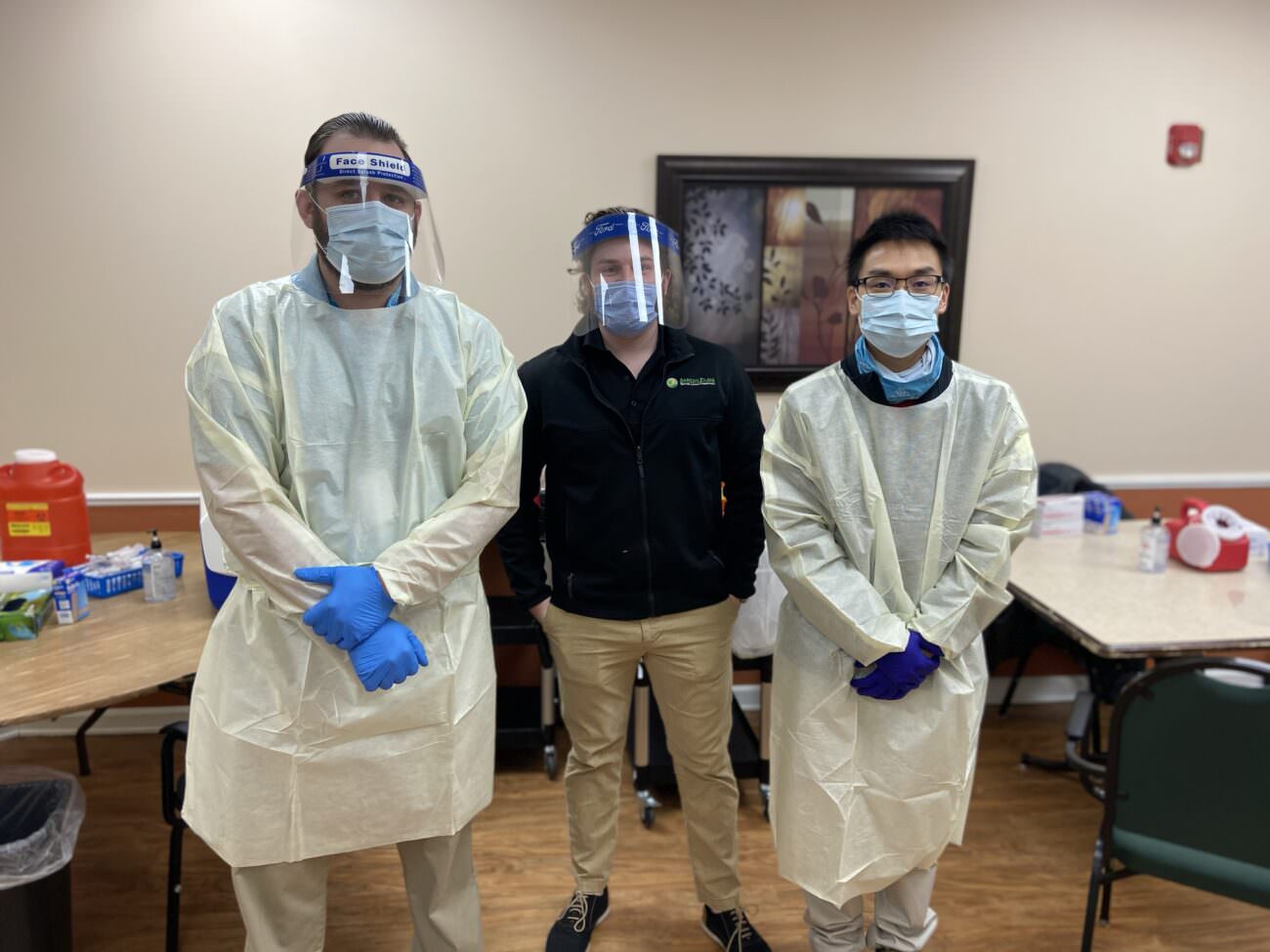 Kevin Christiano, Ashton Place Administrator, stands with two medical workers who administered the Pfizer BioNTech COVID-19 vaccine on Monday, January 11th, 2021