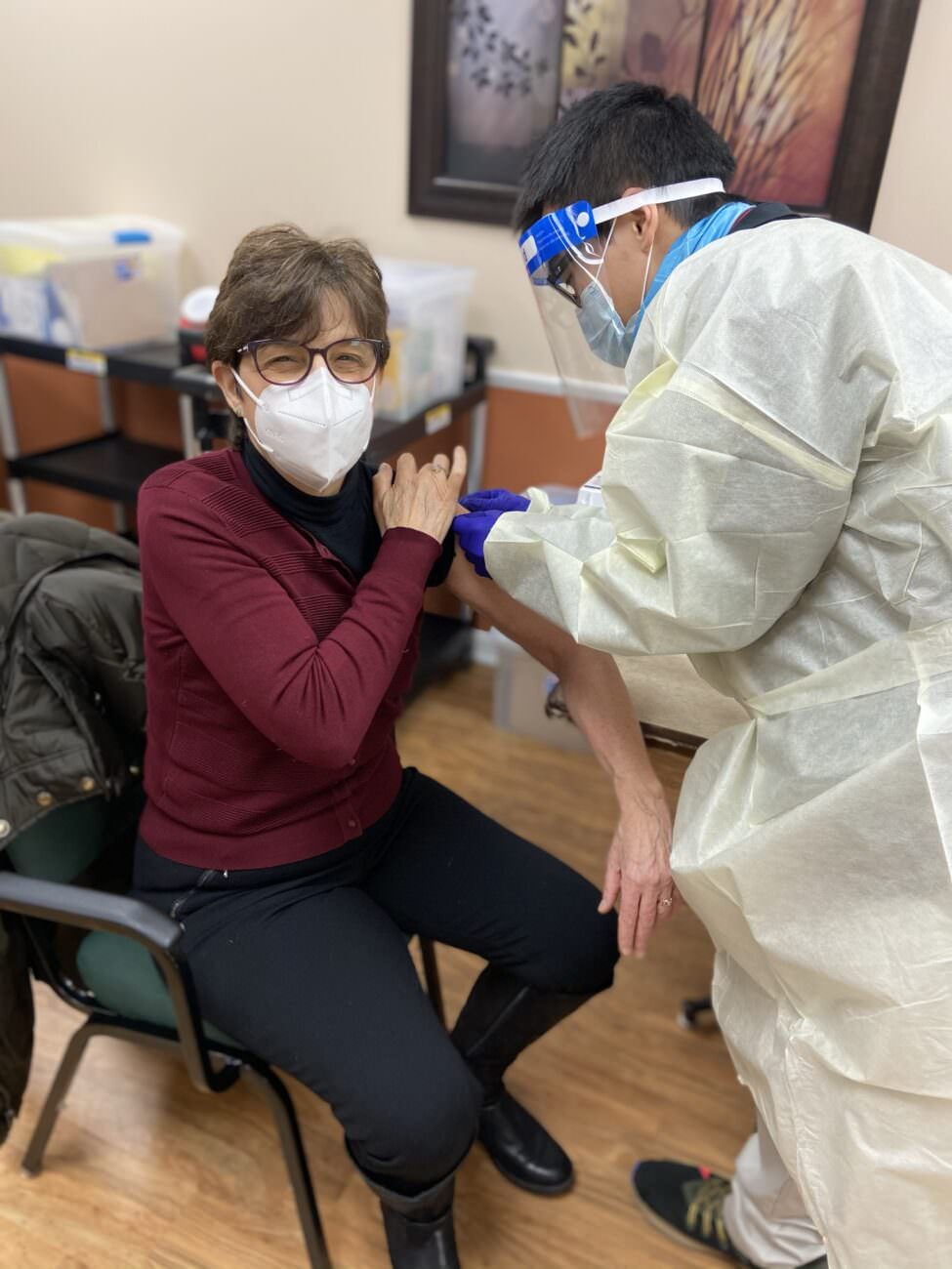 An Ashton Place resident receives the Pfizer-BioNTech COVID-19 vaccine 