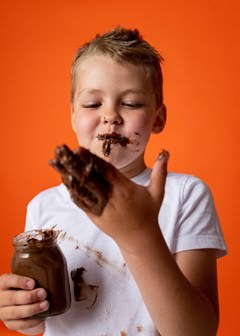 boy eating chocolate